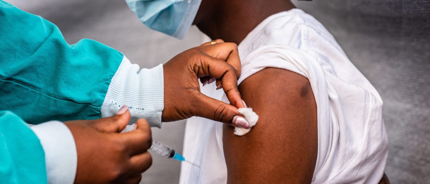 Patient,Receiving,Their,Vaccination,Injection,At,A,Local,Clinic,In